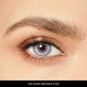 innocent white lenses on dark brown eyes